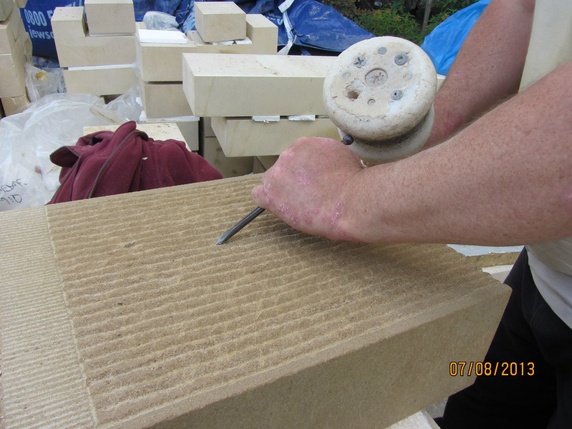 Smooth sandstone carving by IMC Stonemasons Limited in Edinburgh, showcasing expert craftsmanship in traditional stonework.