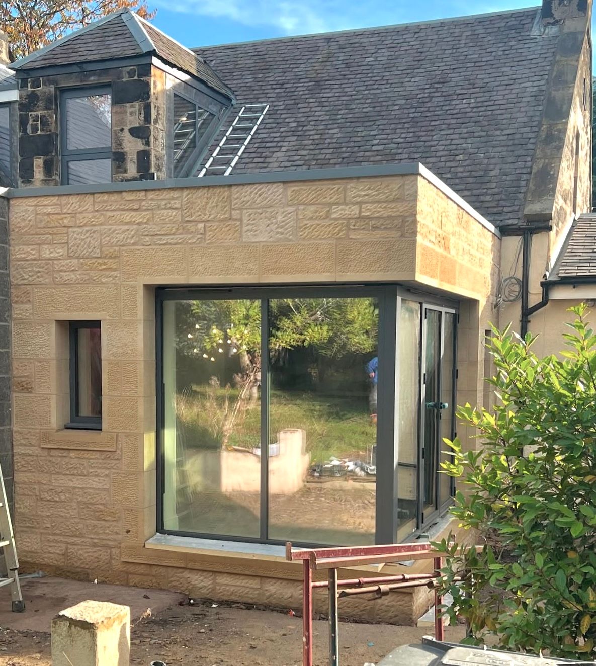Elegant stone extension with bespoke masonry work by IMC Stonemasons Limited in Edinburgh.